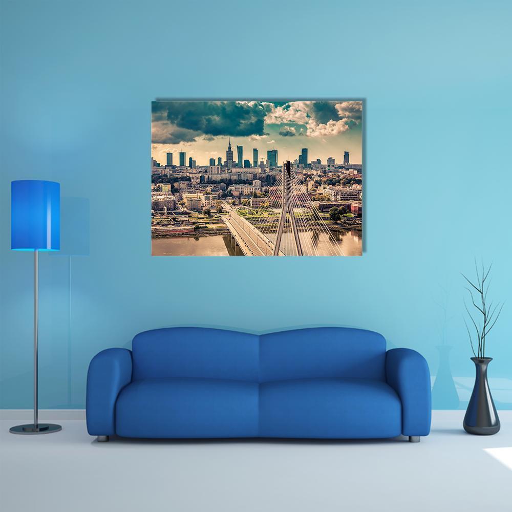 Warsaw Skyline Behind the Bridge Canvas Wall Art in gray, beige and blue, single panel hung on a wall