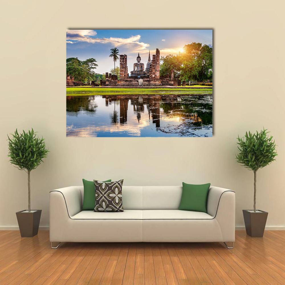 Wat Mahathat Temple Sunset Reflection Canvas Wall Art in orange, green and blue, single panel hung on a wall