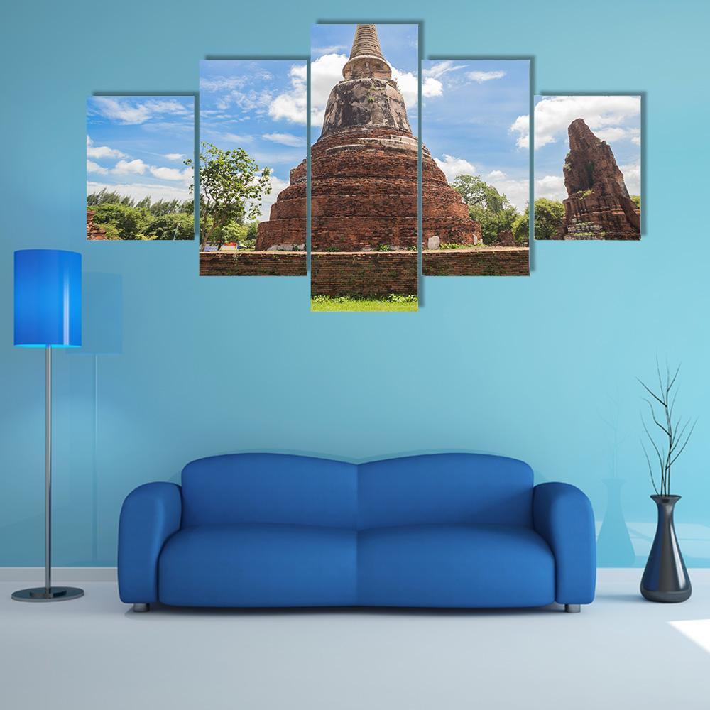 Wat Mahathat Temple in Thailand Canvas Wall Art in white, brown and blue, 5 panel Star layout hung on a wall