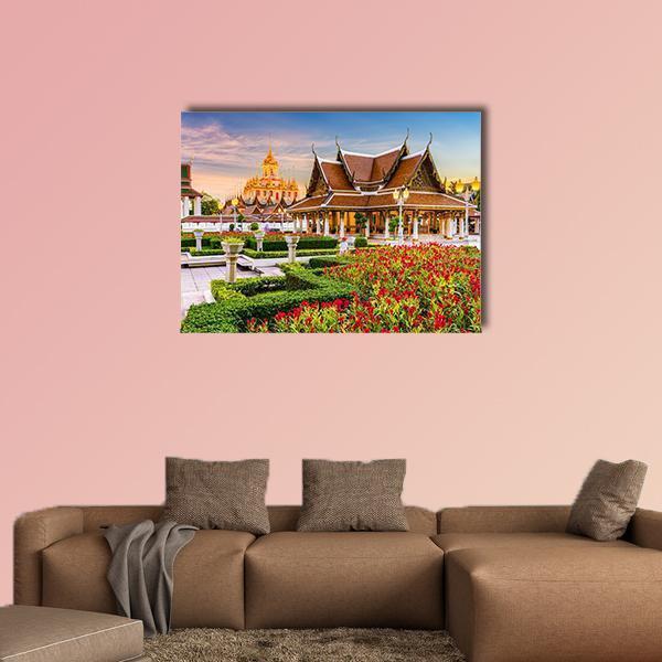 Wat Ratchanatdaram Temple Garden at Dusk Canvas Wall Art in gold, green and blue, single panel hung on a wall