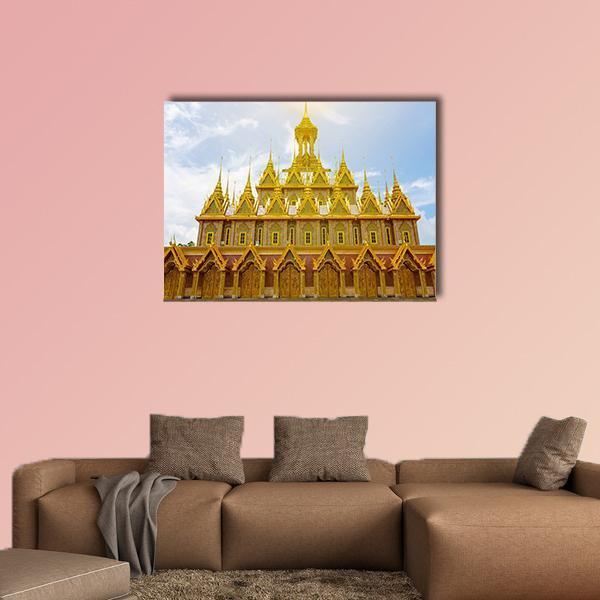 Wat Tha Sung Temple Canvas Wall Art in gold, yellow and blue, single panel hung on a wall