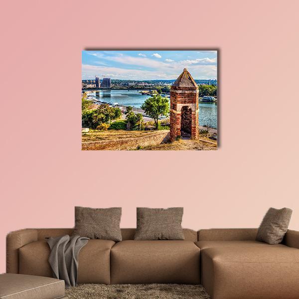 Brick Watchtower at Kalemegdan Fortress Canvas Wall Art in brown, green and blue, single panel hung on a wall