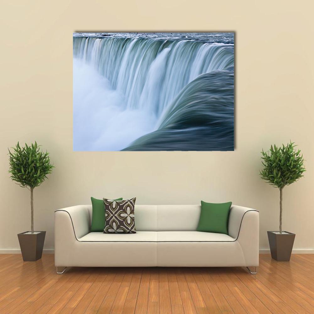 Silky Water Over Niagara Falls Canvas Wall Art in white, green and blue, single panel hung on a wall