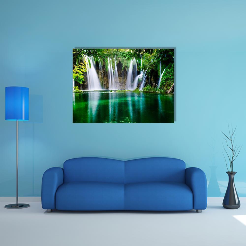 Plitvice Waterfalls and Lake Reflections Canvas Wall Art in white and green, single panel hung on a wall