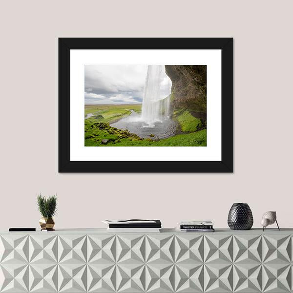 Waterfall In Iceland Between Mountains From River Spring Canvas Wall Art-1 Piece-Framed Print-20" x 16"-Tiaracle