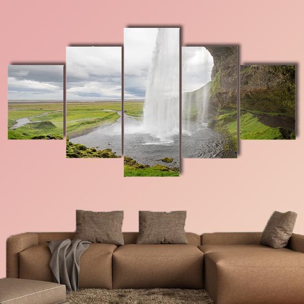 Waterfall In Iceland Between Mountains From River Spring Canvas Wall Art-5 Star-Gallery Wrap-62" x 32"-Tiaracle