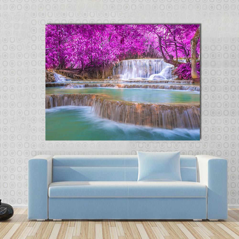 Waterfall in Rain Forest Canvas Wall Art in white, green and purple, single panel hung on a wall