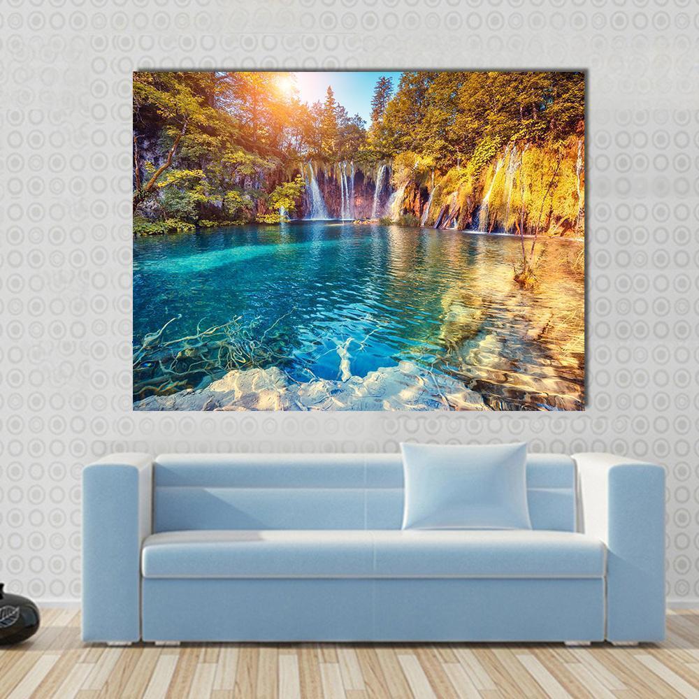 Waterfalls at Plitvice Lakes National Park Canvas Wall Art in yellow, green and blue, single panel hung on a wall