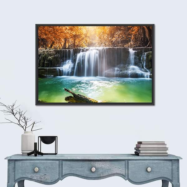 Tropical Rainforest Waterfall Canvas Wall Art in orange, green and blue, framed canvas, product view on a white background