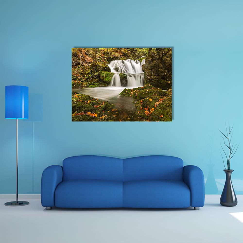 Kropa Waterfall in Voje Valley Canvas Wall Art in white, brown and green, single panel hung on a wall