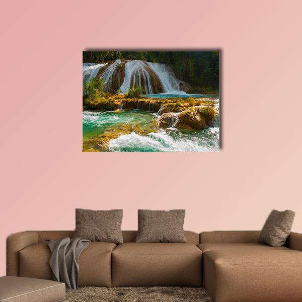 Agua Azul Waterfall Canvas Wall Art in brown, green and blue, single panel hung on a wall