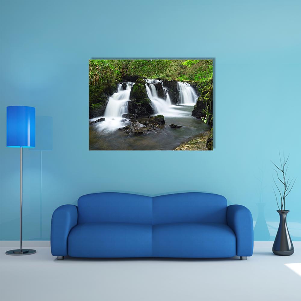 Clare Glens Waterfall, Ireland Canvas Wall Art in white, brown and green, single panel hung on a wall
