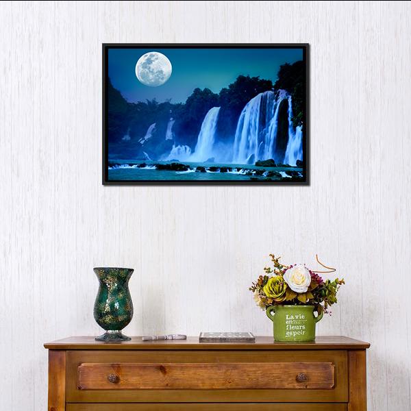 Waterfall Under Moonlight Canvas Wall Art in white and blue, framed canvas, product view on a white background