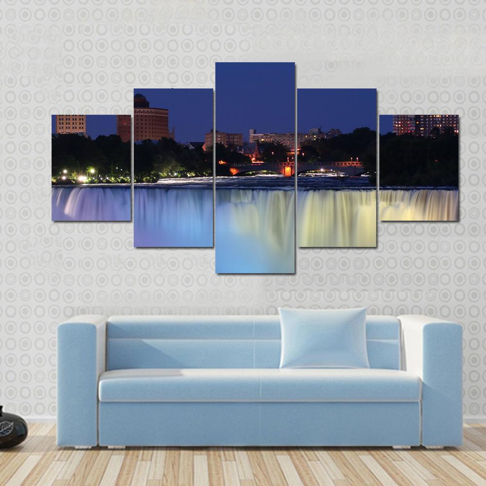 Waterfall With City At Night Above With Lights Canvas Wall Art-5 Star-Gallery Wrap-62" x 32"-Tiaracle