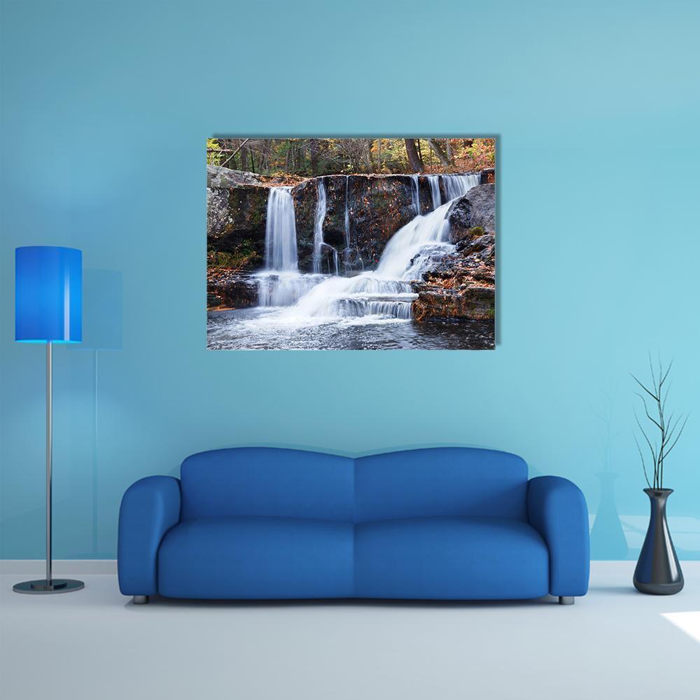Silky Autumn Waterfall with Trees and Rocks Canvas Wall Art in white, gray and brown, single panel hung on a wall