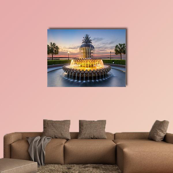 Waterfront Park Pineapple Fountain Canvas Wall Art in orange, yellow and blue, single panel hung on a wall