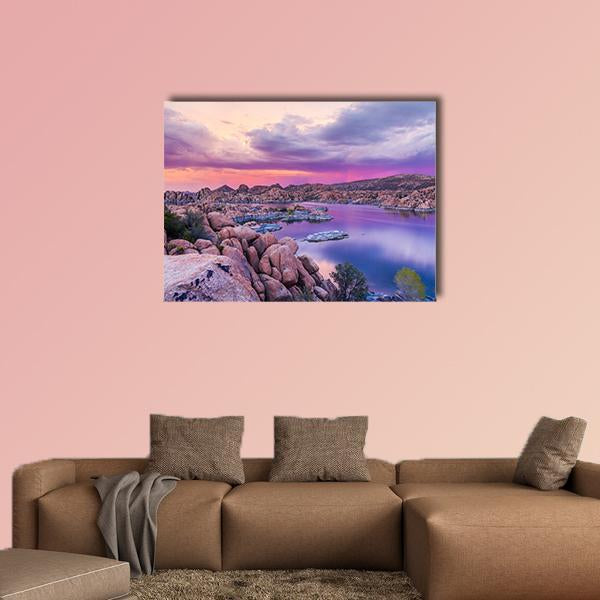Watson Lake Sunset Over Granite Boulders Canvas Wall Art in blue, purple and pink, single panel hung on a wall