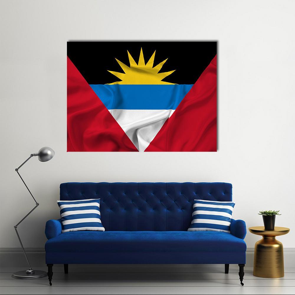 Waving Antigua and Barbuda Flag Canvas Wall Art in black, red and blue, single panel hung on a wall