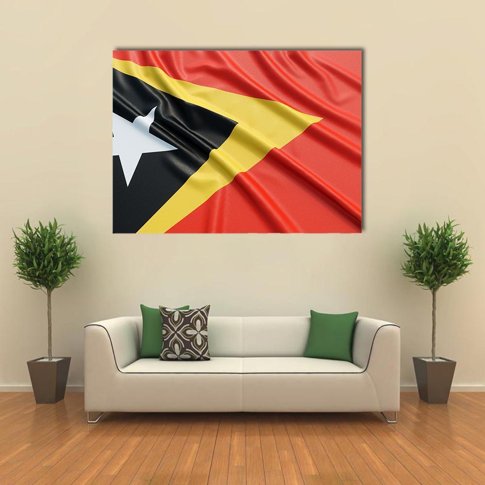 Waving East Timor Flag Canvas Wall Art in black, red and yellow, single panel hung on a wall