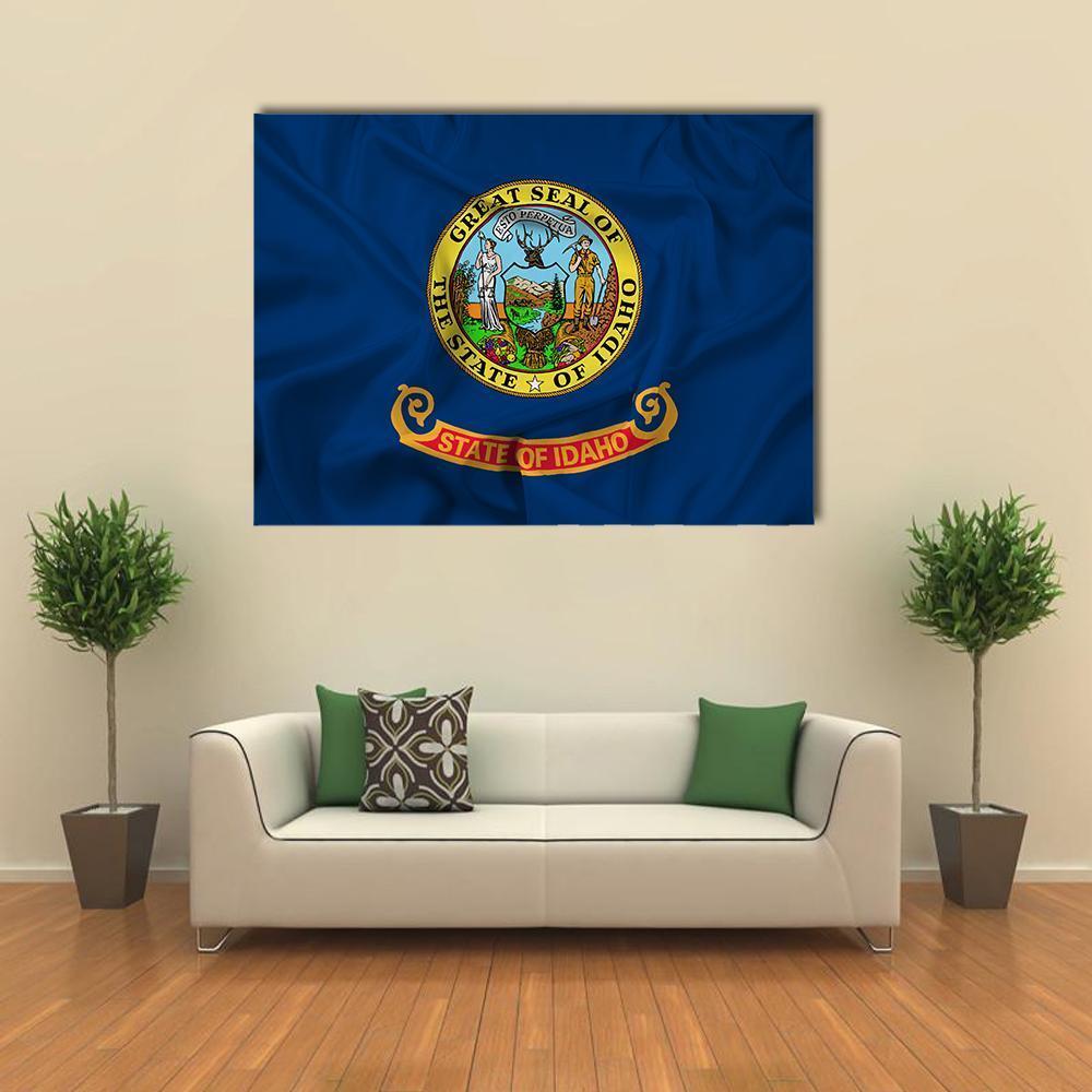 Waving Idaho State Flag Canvas Wall Art in gold and blue, single panel hung on a wall