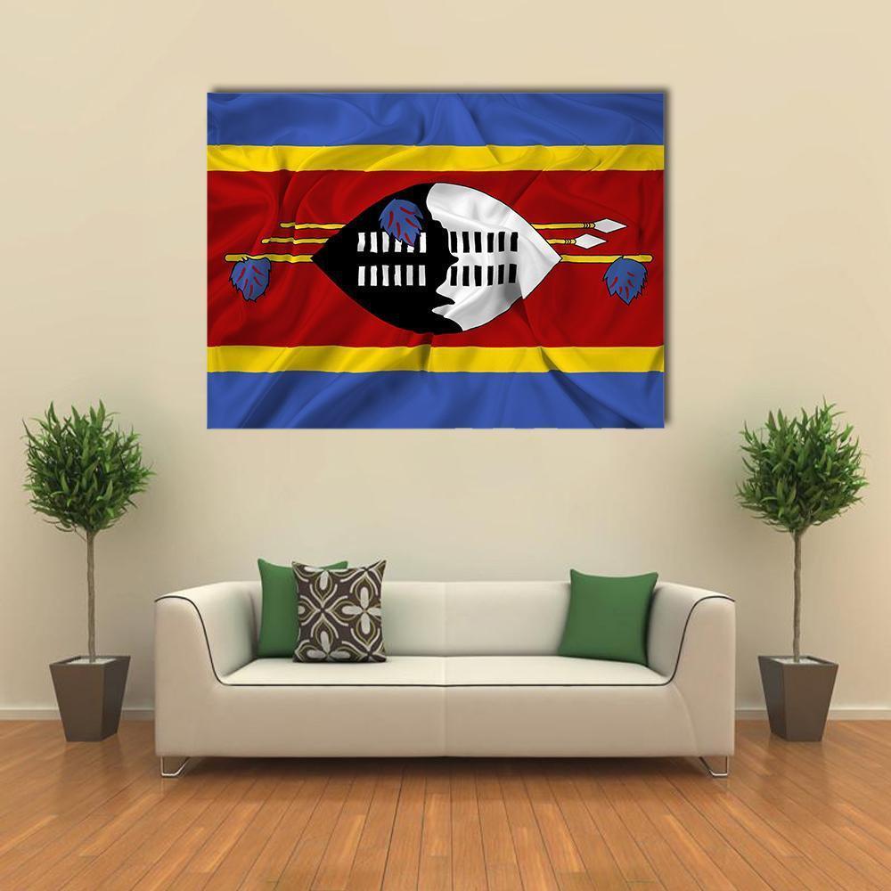 Waving Eswatini Flag Canvas Wall Art in red, yellow and blue, single panel hung on a wall