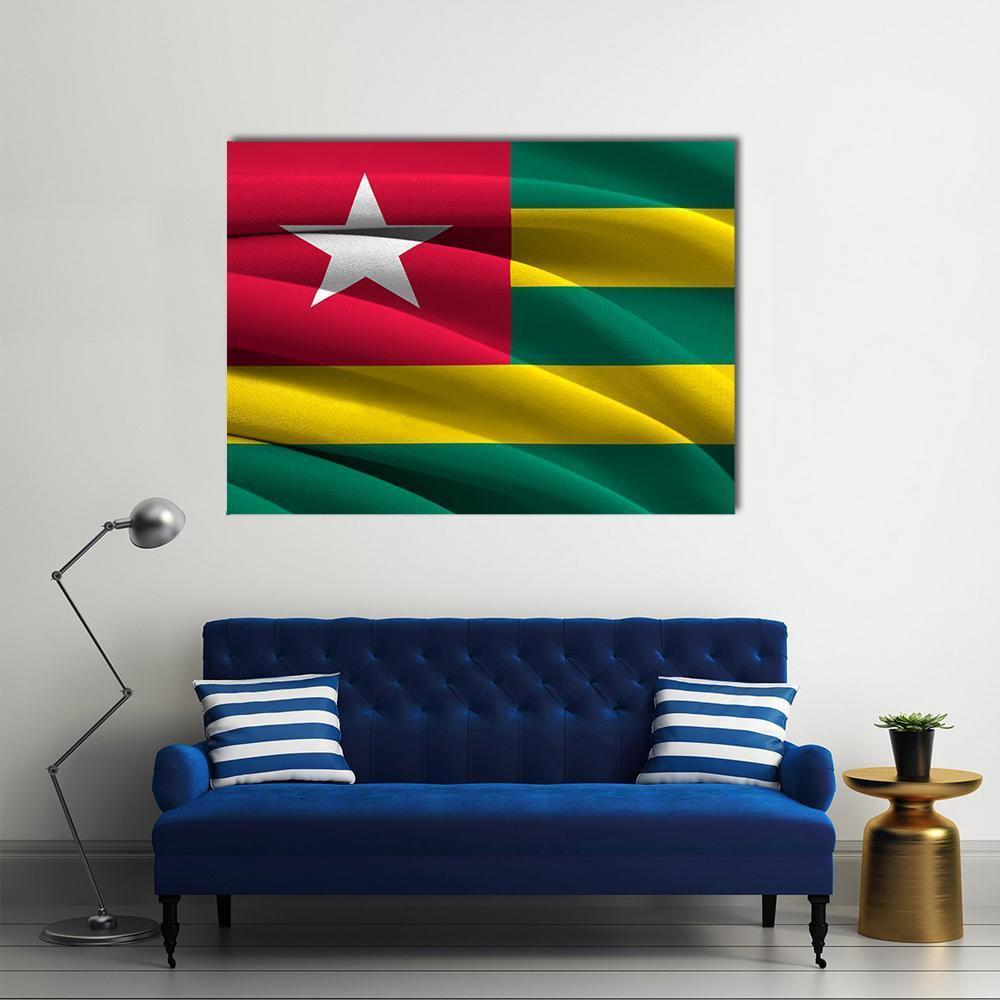 Waving Togo Flag Canvas Wall Art in red, yellow and green, single panel hung on a wall