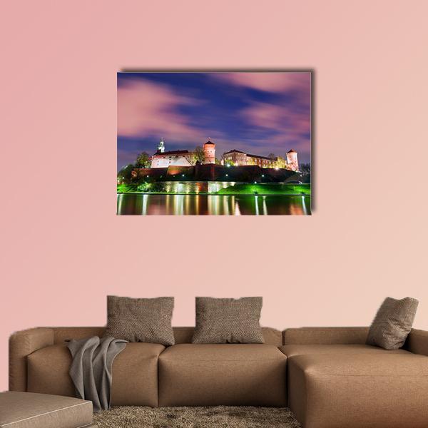 Wawel Castle Night View Canvas Wall Art in blue, purple and pink, single panel hung on a wall