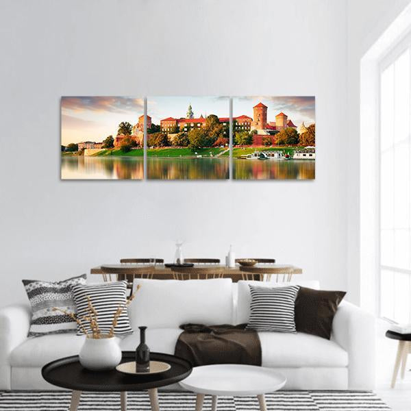 Wawel Royal Castle in Krakow at Sunset Panoramic Canvas Wall Art in orange, green and blue, hung on a wall