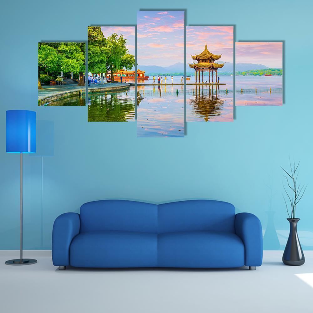 West Lake Hangzhou at Sunset Canvas Wall Art in green, blue and pink, 5 panel Star layout hung on a wall