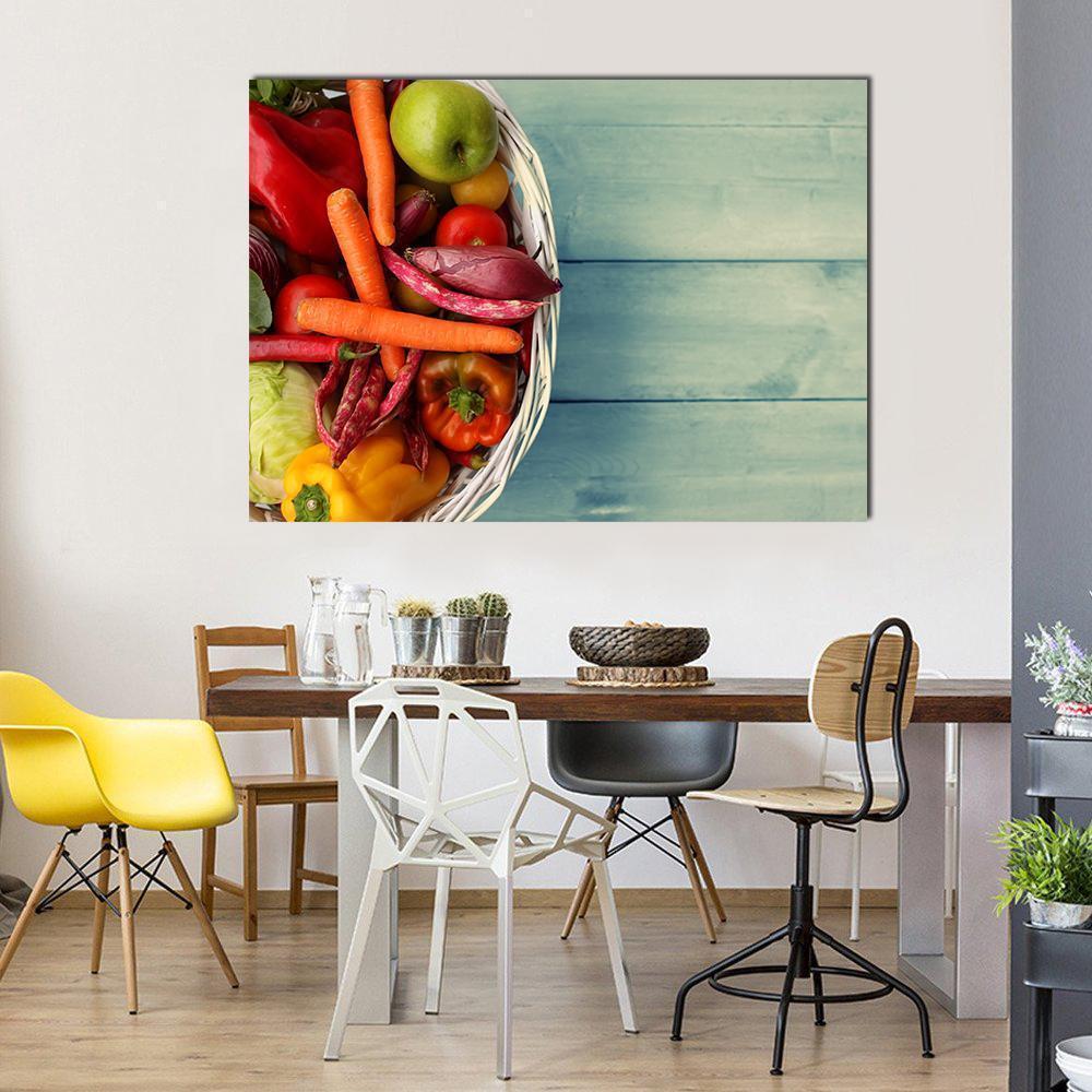 White Basket of Assorted Vegetables Canvas Wall Art in green, blue and multicolor, single panel hung on a wall