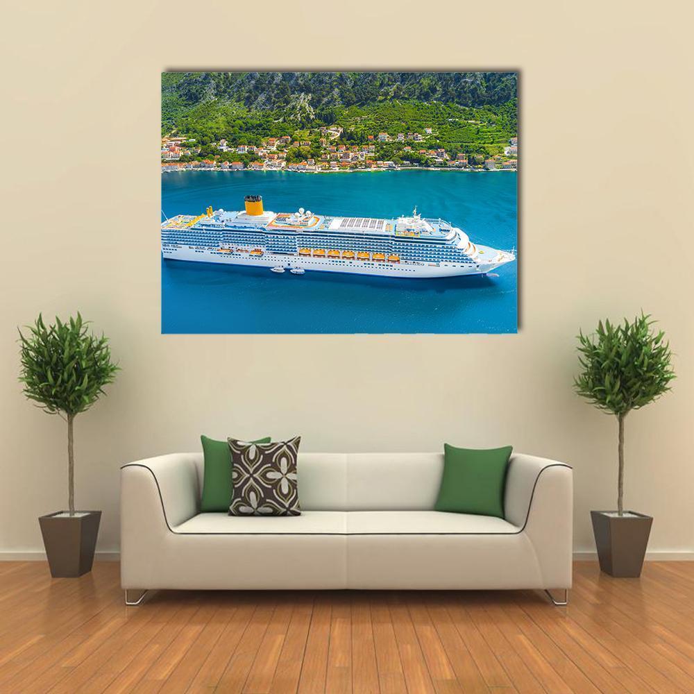 White Cruise Ship in the Bay Canvas Wall Art in white, green and blue, single panel hung on a wall
