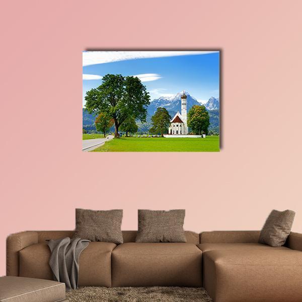 White St. Coloman Pilgrimage Church Canvas Wall Art in white, green and blue, single panel hung on a wall