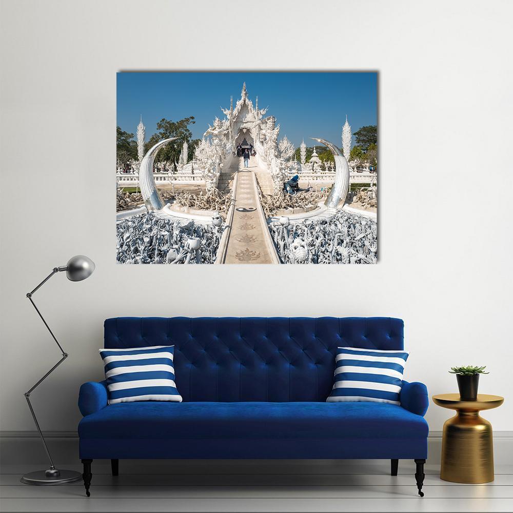 Serene White Temple in Chiang Rai Canvas Wall Art in white and blue, single panel hung on a wall