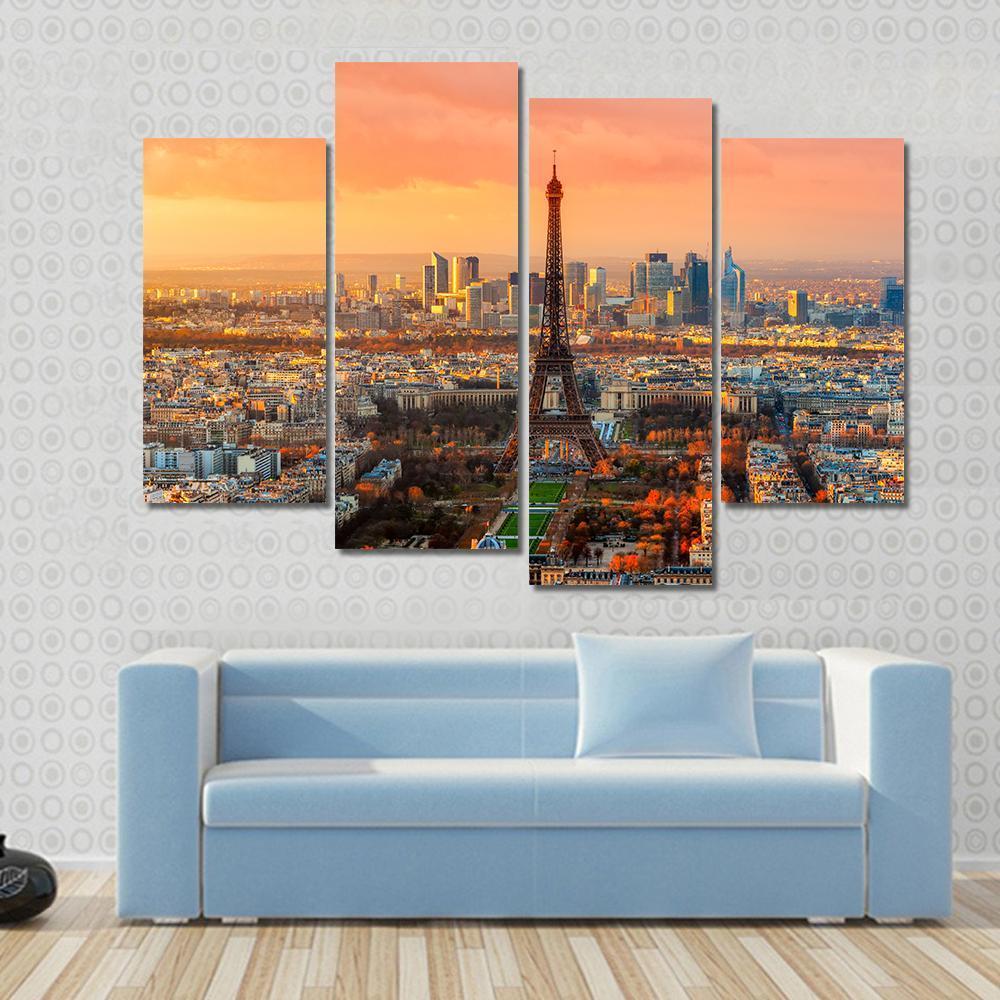 Paris Twilight View Canvas Wall Art in orange, yellow and blue, 4 panel Pop layout hung on a wall