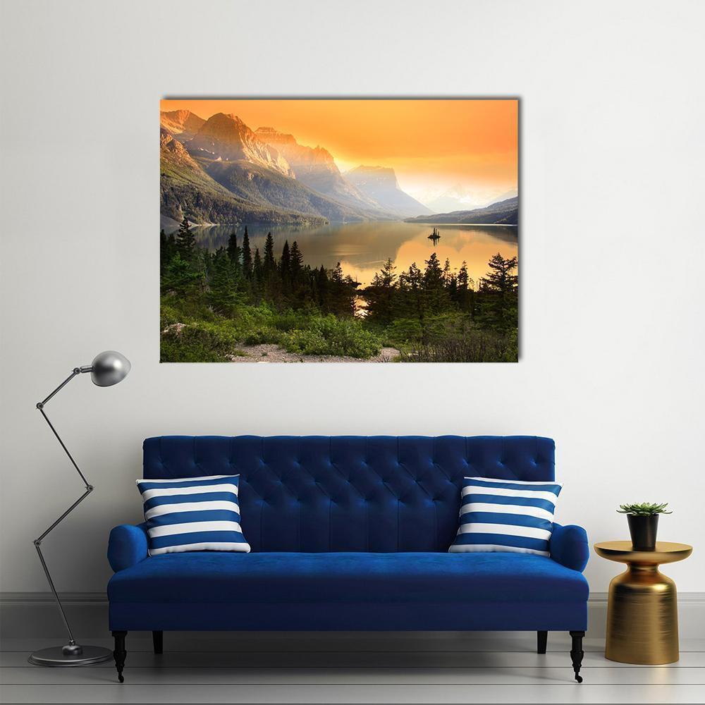 Wild Goose Island on Saint Mary Lake Canvas Wall Art in orange, yellow and green, single panel hung on a wall