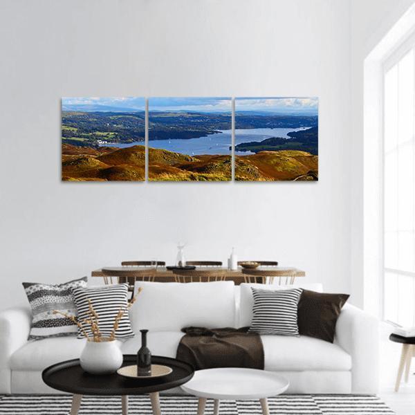Windermere Lake, England Panoramic Canvas Wall Art in brown, green and blue, hung on a wall