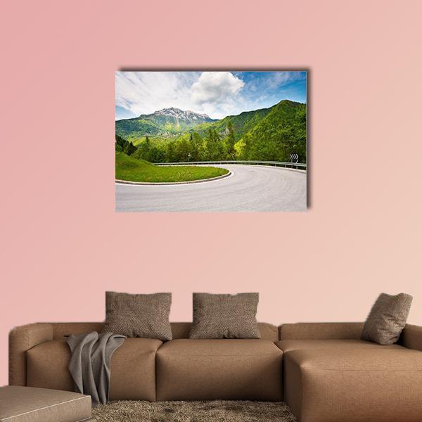 Winding Road in the Italian Alps Canvas Wall Art in gray, green and blue, single panel hung on a wall