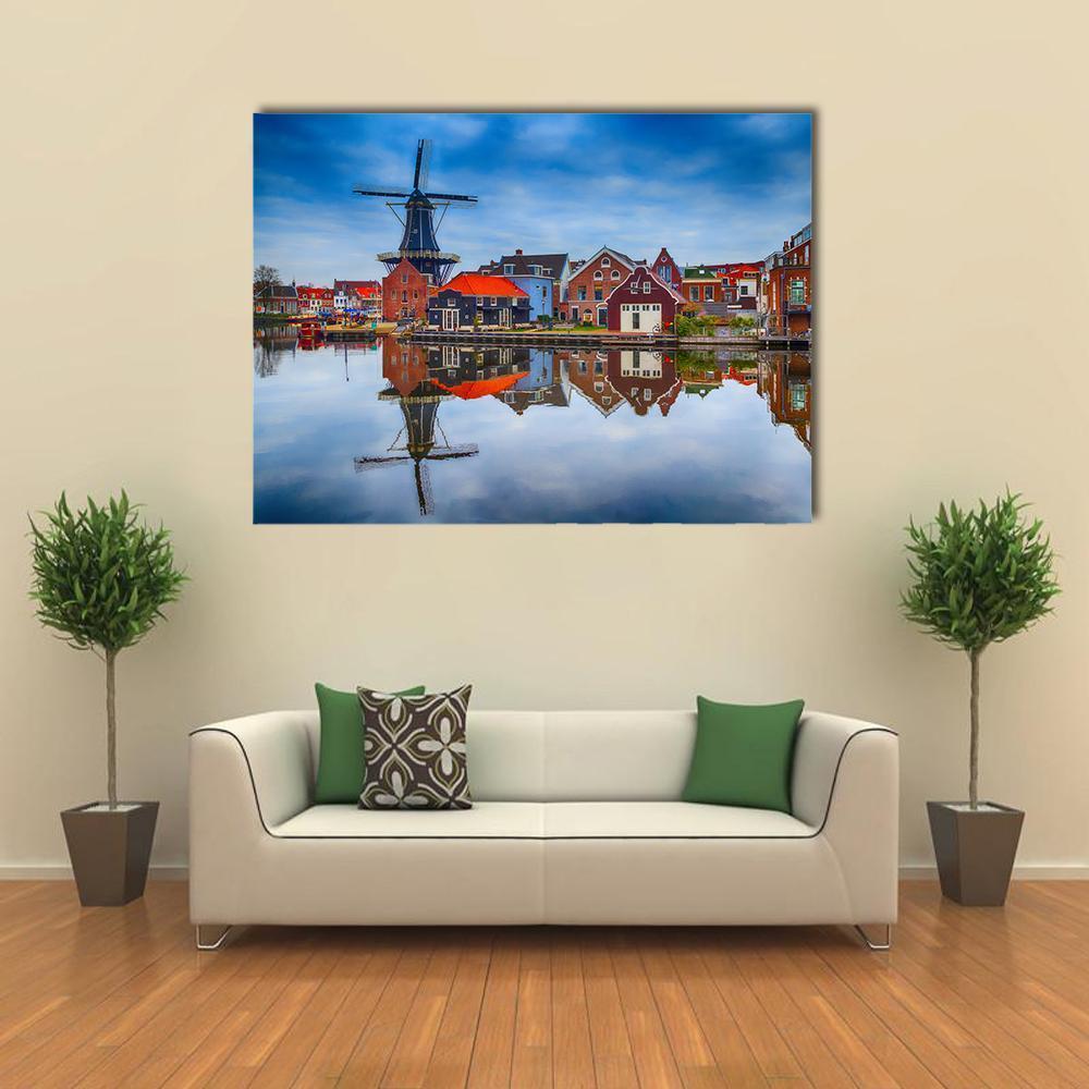 Windmill and Gabled Houses in Haarlem Canvas Wall Art in brown, red and blue, single panel hung on a wall