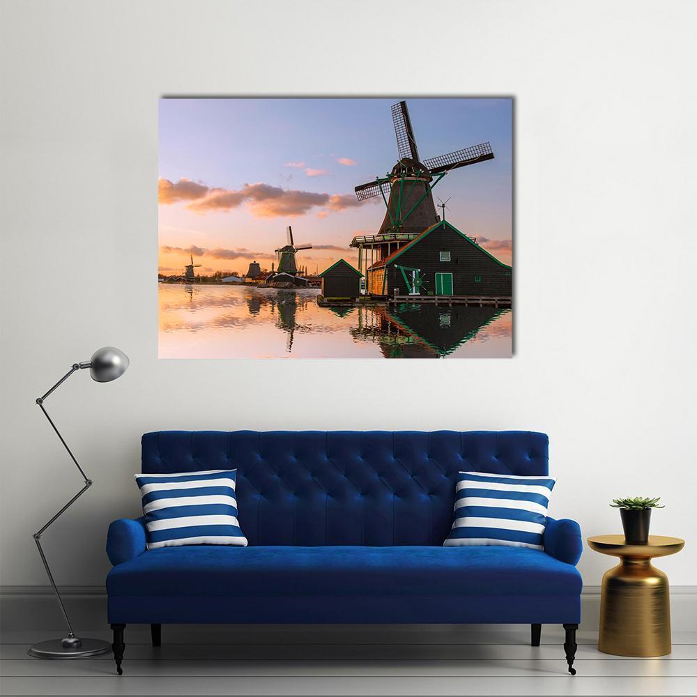 Windmills and Canal Near Amsterdam Canvas Wall Art in brown, orange and blue, single panel hung on a wall