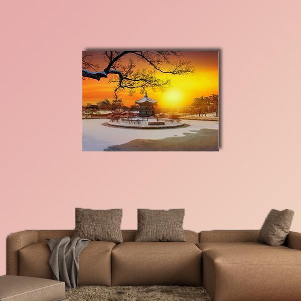 Winter Sunset at Gyeongbokgung Palace Canvas Wall Art in white, orange and yellow, single panel hung on a wall