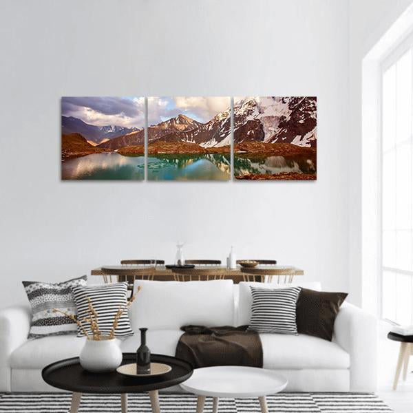 Winter Mountain Lake in Switzerland Panoramic Canvas Wall Art in white, brown and blue, hung on a wall