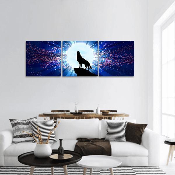 Howling Wolf Under Full Moon Panoramic Canvas Wall Art in black, white and blue, hung on a wall