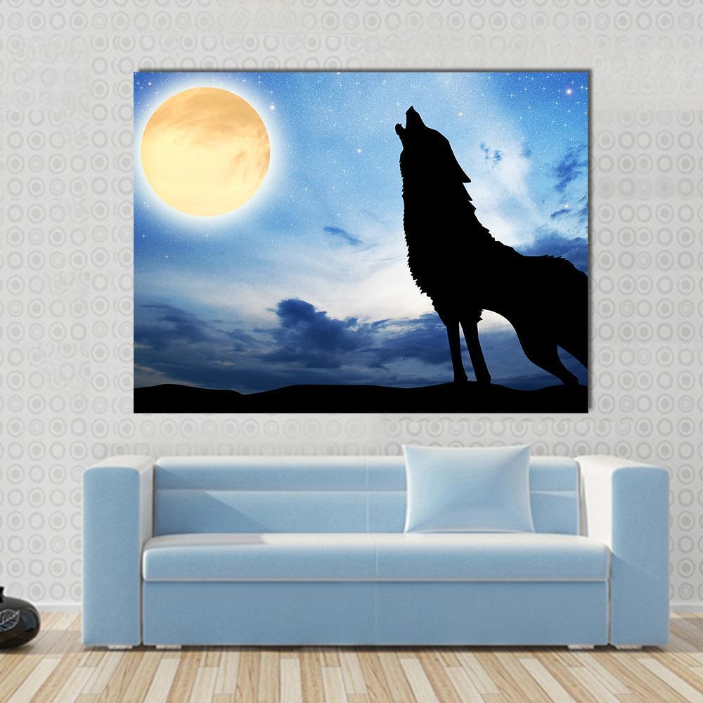 Wolf Silhouette in Front of Moon Canvas Wall Art in black, yellow and blue, single panel hung on a wall