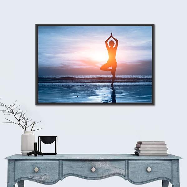 Woman Practicing Yoga at the Beach Canvas Wall Art in orange, yellow and blue, framed canvas, product view on a white background