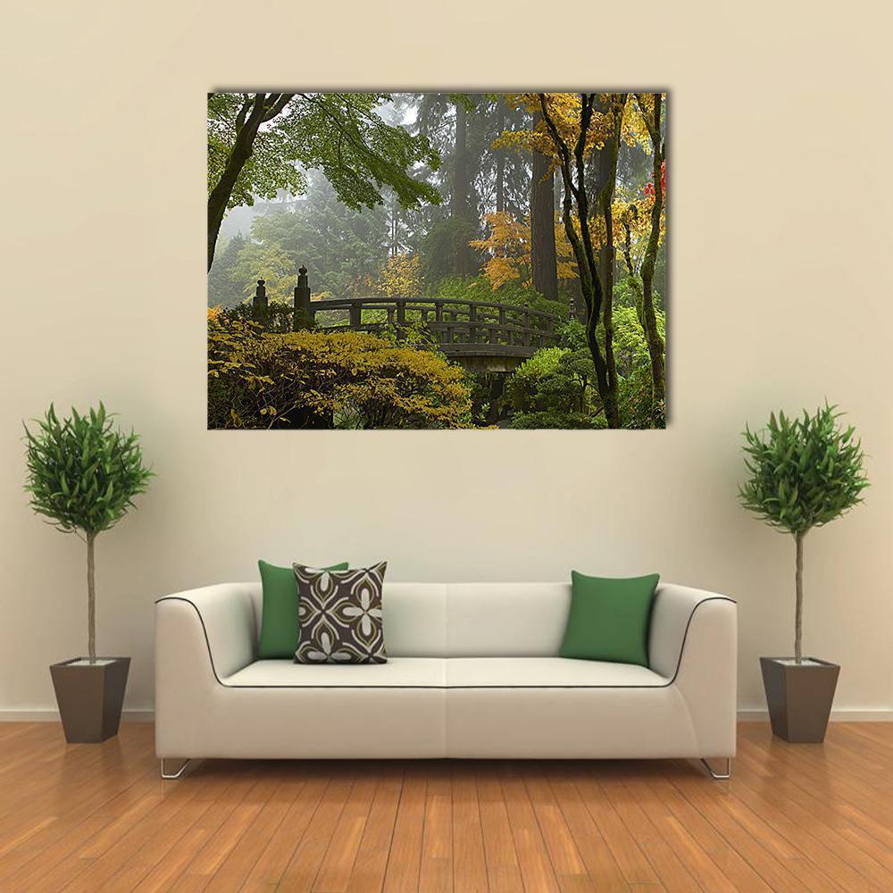 Wooden Bridge at Japanese Garden Canvas Wall Art in brown, yellow and green, 3 panel horizontal set hung on a wall