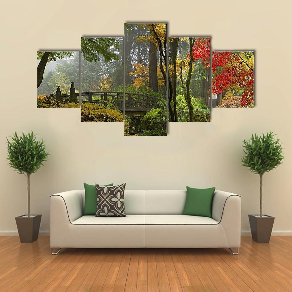 Wooden Bridge at Japanese Garden Canvas Wall Art in brown, yellow and green, 3 panel horizontal set hung on a wall