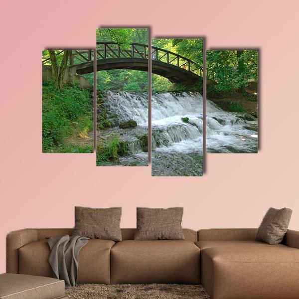 Wooden Bridge Over Small Waterfall Canvas Wall Art-4 Pop-Gallery Wrap-50" x 32"-Tiaracle