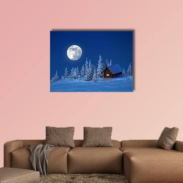 Wooden House in Winter Forest Canvas Wall Art in white and blue, single panel hung on a wall