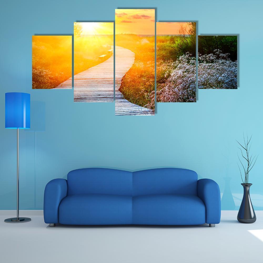 Winding Boardwalk Over Beach Dunes Canvas Wall Art in gray, orange and yellow, 5 panel Star layout hung on a wall