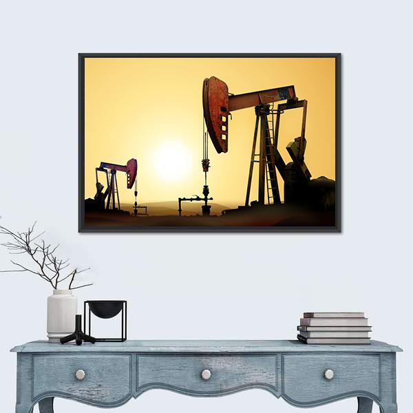 Two Oil Pump Jacks at Sunset Canvas Wall Art in black, orange and yellow, framed canvas, product view on a white background
